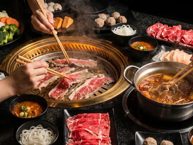 Gangnam Korean BBQ grill with sizzling meat